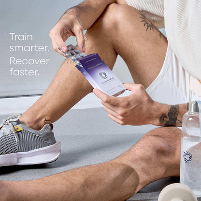 Person holding a purple container with text 'Train smarter. Recover faster.' on a gray background